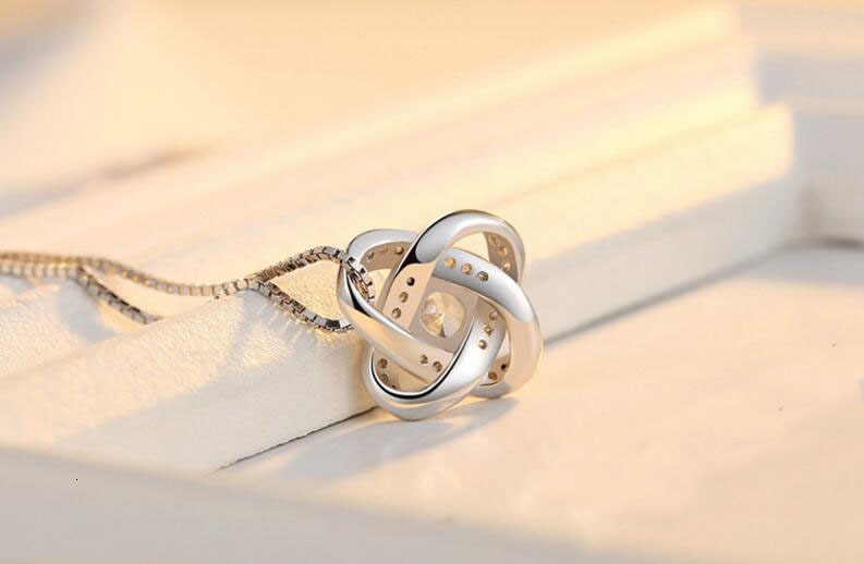 EVERLOVE:  "Heart Knot" Sterling Silver Necklace